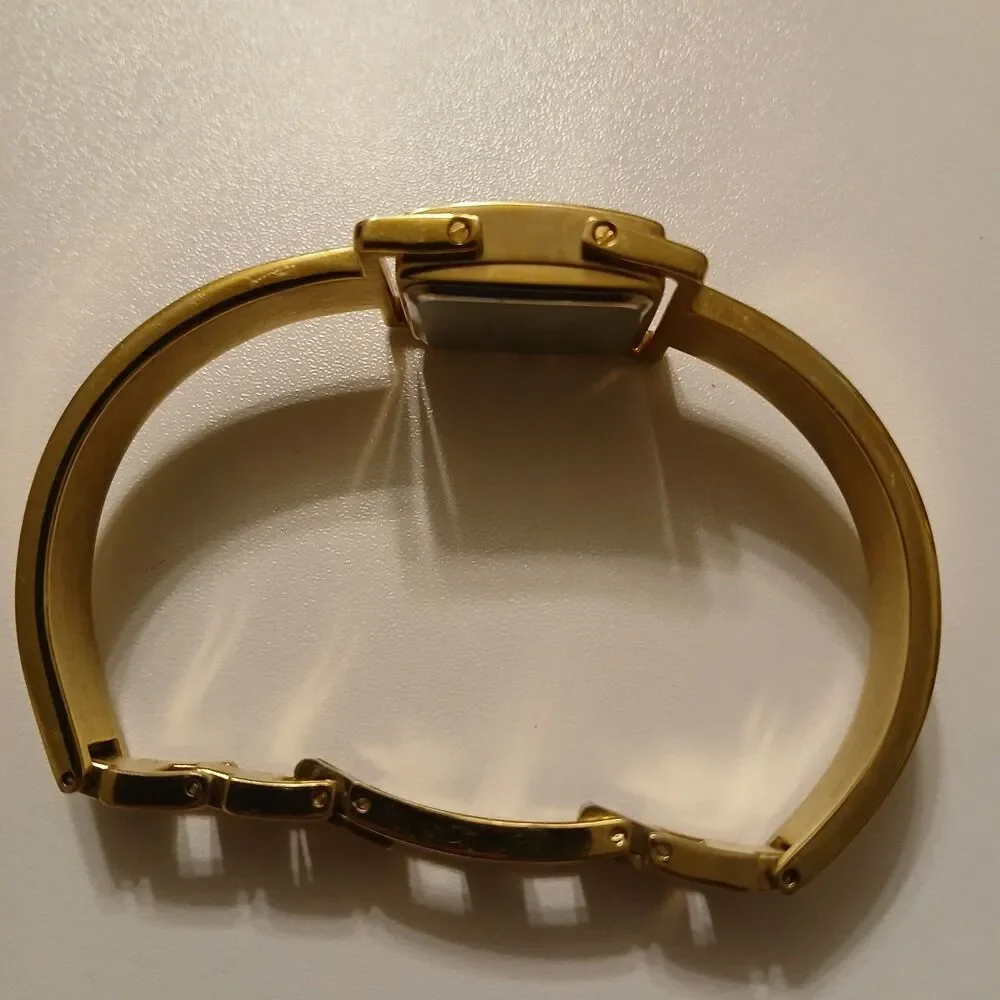 VTG 90s Joan Rivers Classics Gold Tone MOP Dial Quartz Bangle Women's Watch 19mm